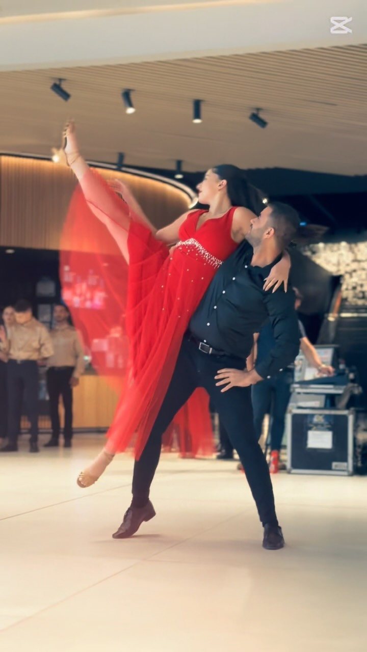 Contemporary dance performance with red dress